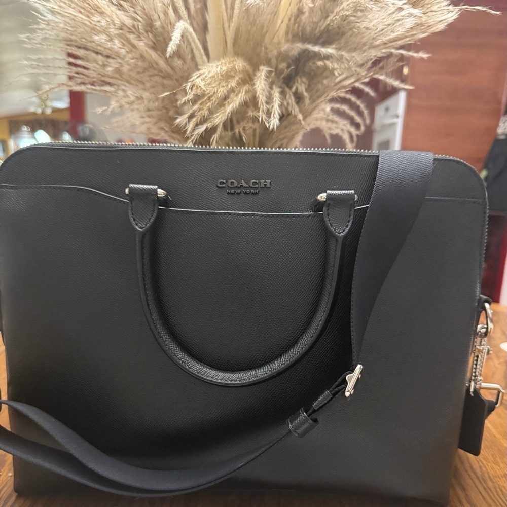 Coach Black Briefcase with Structured Design and Metallic Accents